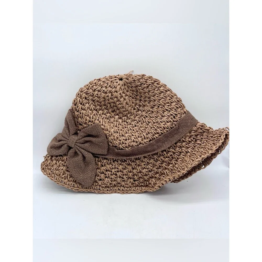Women’s crocheted straw cloche hat with a bowknot
